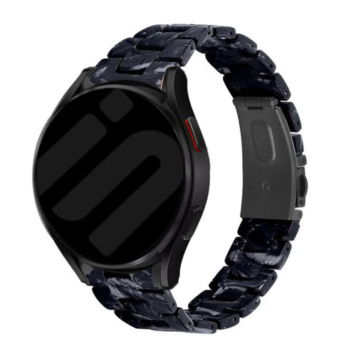 Metal Resin Strap, black/white, on a watch, 3/4 front view