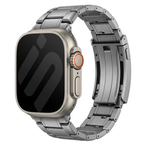 Adjustable Titanium Strap, graphite, on a watch, 3/4 front view