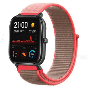 Nylon Strap, neon pink, on a watch, 3/4 front view