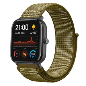 Nylon Strap, olive, on a watch, 3/4 front view