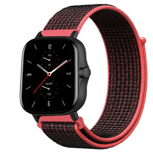 Nylon Strap, black/coral, on a watch, 3/4 front view