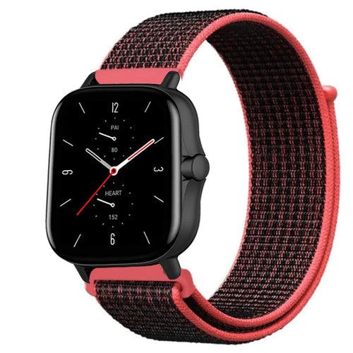 Nylon Strap, black/coral, on a watch, 3/4 front view