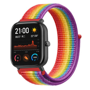 Nylon Strap, rainbow, on a watch, 3/4 front view