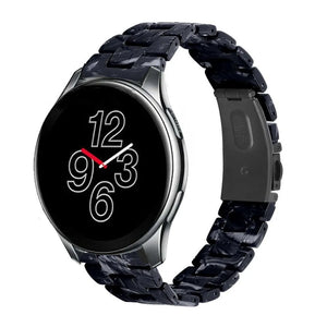 Metal Resin Strap, black/white, on a watch, 3/4 front view
