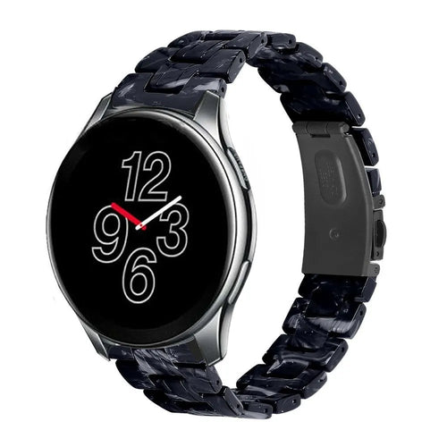 Metal Resin Strap, black/white, on a watch, 3/4 front view