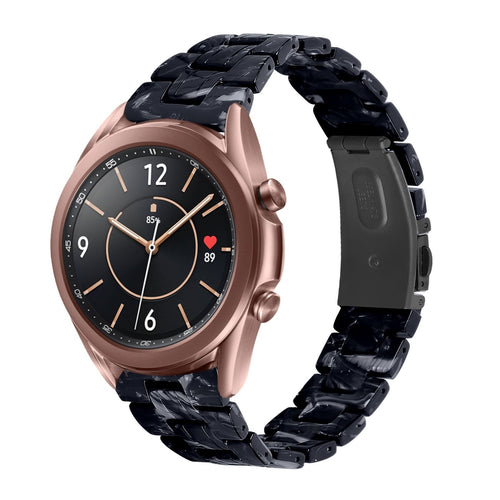 Metal Resin Strap, black/white, on a watch, 3/4 front view