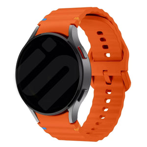 Wave Silicone Strap, orange, on a watch, 3/4 front view