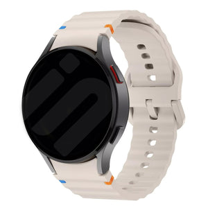 Wave Silicone Strap, starlight, on a watch, 3/4 front view