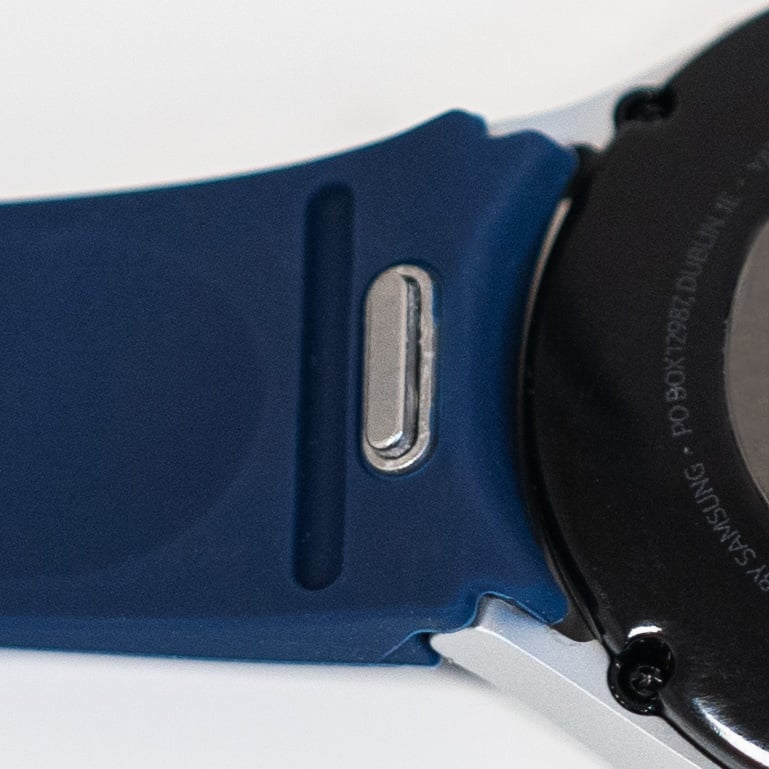 Silicone Strap 'One Push', dark blue, on a watch, 3/4 rear view