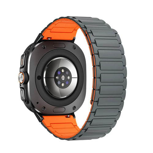 Magnetic Silicone Strap, grey/orange, on a watch, 3/4 rear view