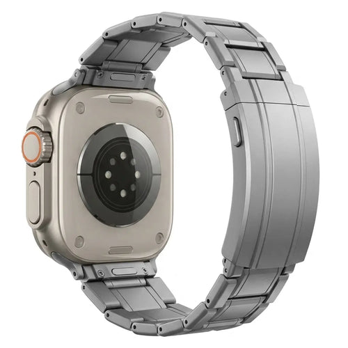 Adjustable Titanium Strap, graphite, on a watch, 3/4 rear view