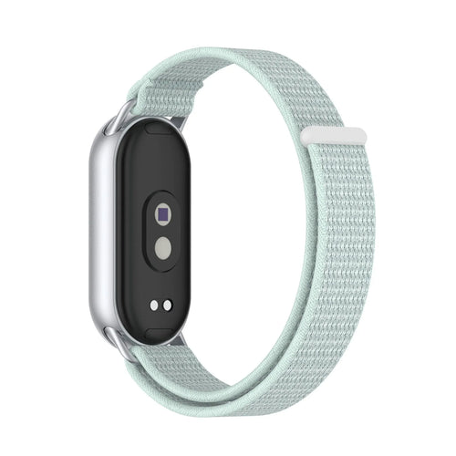 Modern Nylon Strap, cyan, on a watch, 3/4 rear view