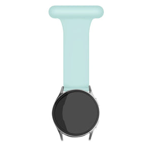 Silicone Nurse Fob, light green, on a watch, direct front view