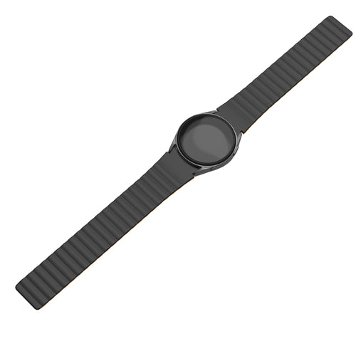 Magnetic Silicone Strap, black/orange, on a watch, direct front view