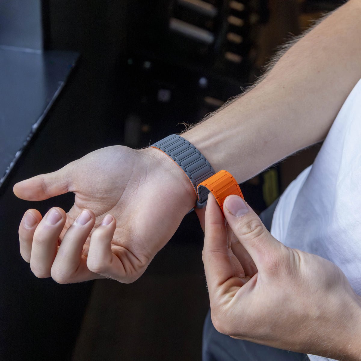 Magnetic Silicone Strap, grey/orange, lifestyle photo