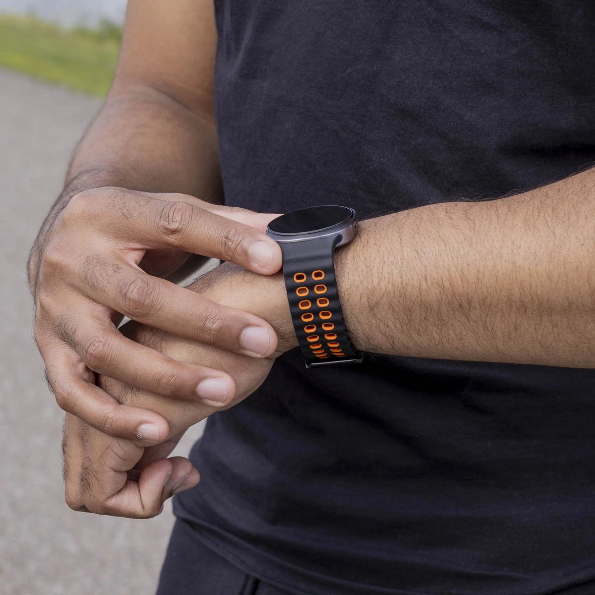 Silicone Ocean Strap, black/orange, lifestyle photo