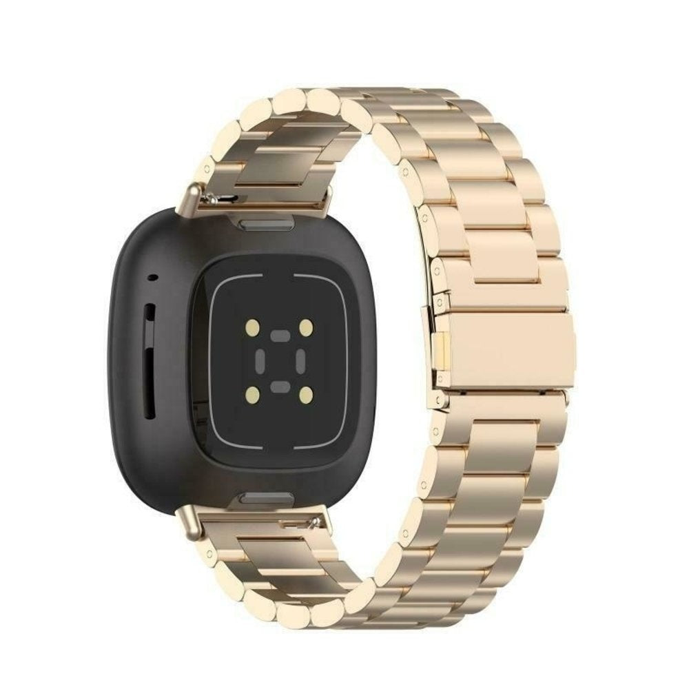 Fitbit versa gold with black band on sale